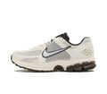 Nike Vomero 5 Sneakers in Metallic Silver and White