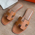 HERM Oran Slide Sandals In Gold Epsom Calfskin