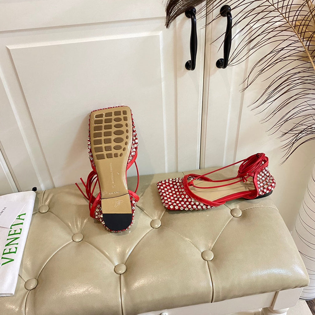 LACE-UP FLAT SANDAL IN RUBY RED METALLIZED MESH AND LEATHER WITH RHINSTONES