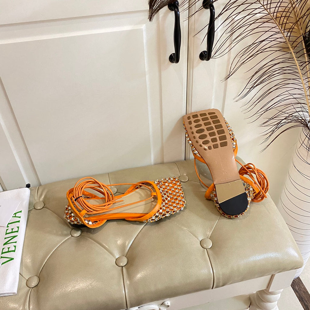 LACE-UP FLAT SANDAL IN VIVID ORANGE METALLIZED MESH AND LEATHER WITH RHINSTONES