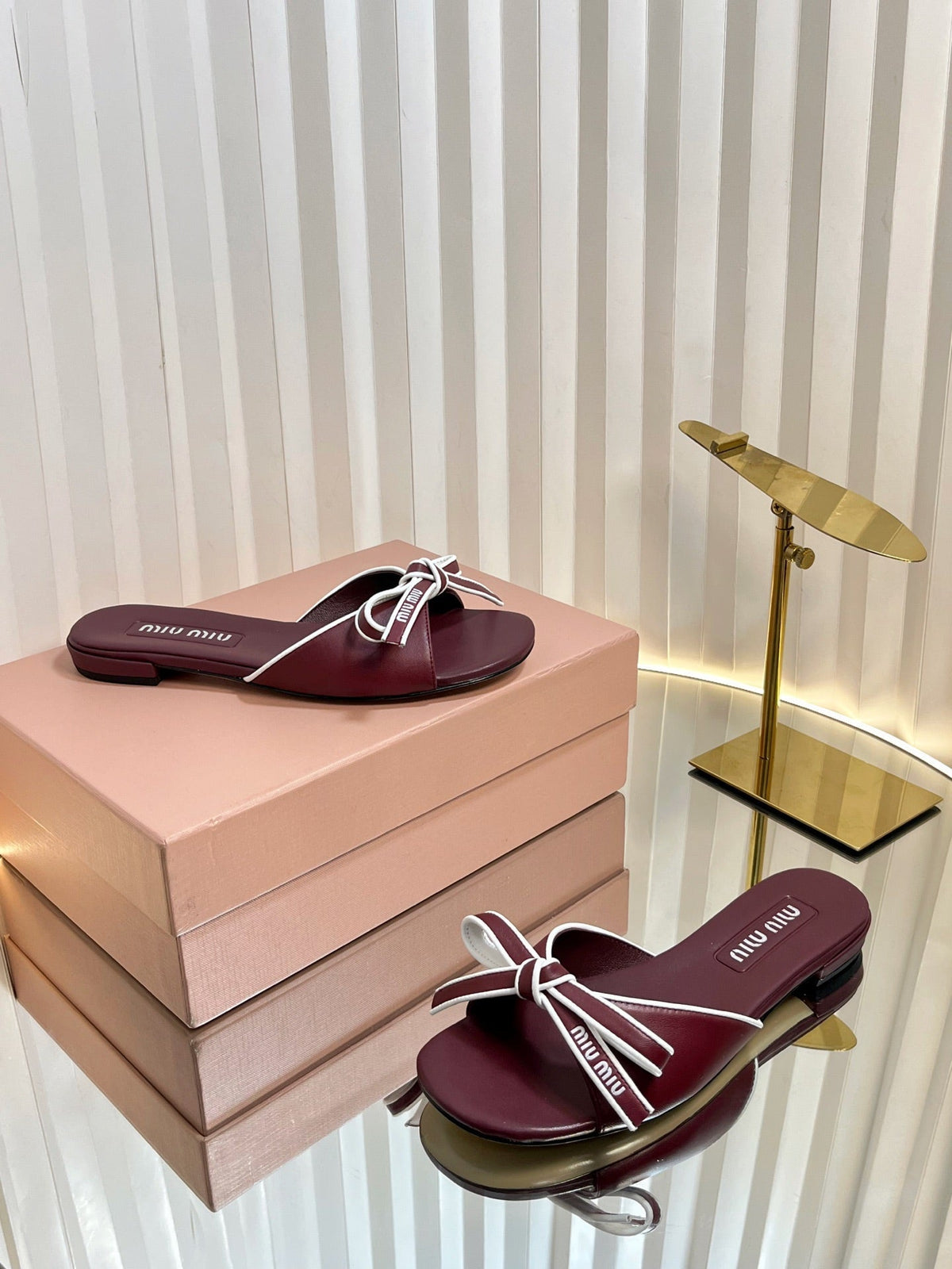 SLIDES SANDALS IN BURGUNDY RED CALFSKIN BOW IN TRAP